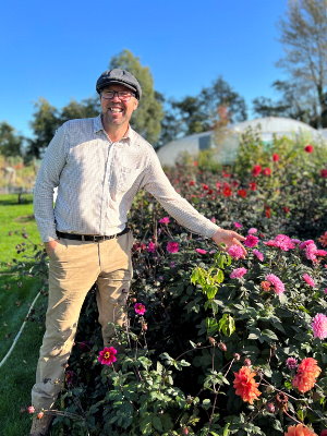 Steve Edney with one of his beloved dahlias